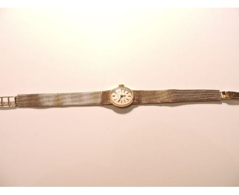 A ladies 9ct gold Tissot mechanical bracelet watch, London 1969