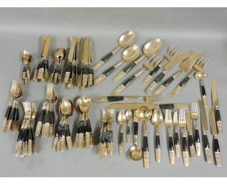 Eight settings of modern Thai cutlery, each item inscribed 'S Samran, Thailand'