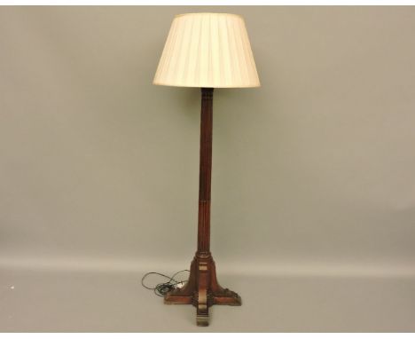 A 19th century mahogany bedpost standard lamp