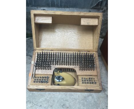 A VINTAGE ESSER SWITZERLAND WATCHMAKERS JEWELING TOOL SET WITH OAK STORAGE BOX