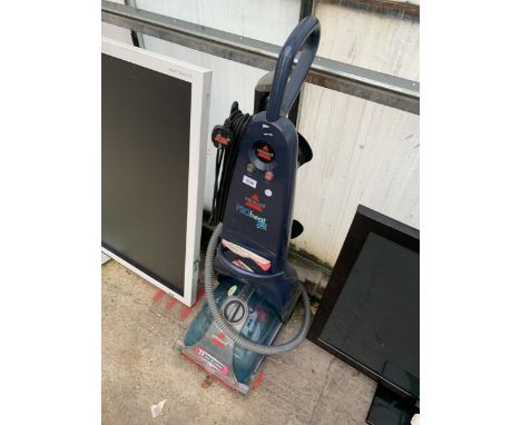 A BISSELL PROHEAT 2X CARPET CLEANER