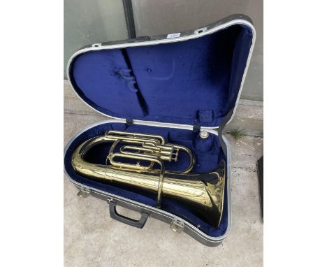 A BOOSEY &amp; HAWKES 400 BRASS TUBA WITH CARRY CASE AND MOUTH PIECE