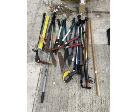 AN ASSORTMENT OF GARDEN TOOLS TO INCLUDE SHEARS, SAWS AND WALKING STICKS ETC