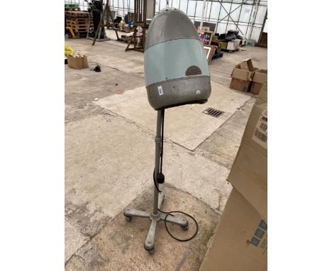 A VINTAGE ELECTRIC HAIR DRYING MACHINE