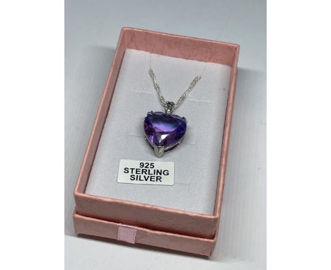 A MARKED 925 SILVER NECKLACE WITH HEART SHAPED AMETHYST PENDANT IN A PRESENTATION BOX