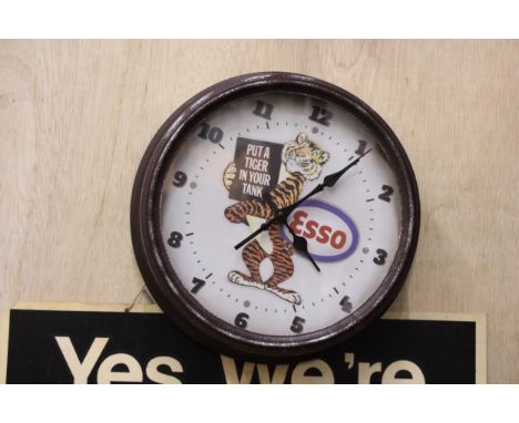 A 'PUT A TIGER IN YOUR TANK' ESSO WALL CLOCK, DIAMETER 27CM