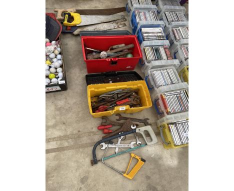 TWO TOOL BOXES AND AN ASSORTMENT OF TOOLS TO INCLUDE AN AXE, SPANNERS AND TROWELS ETC