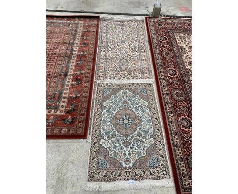 A CREAM PATTERNED FRINGED CARPET RUNNER AND A MATCHING SMALL RUG