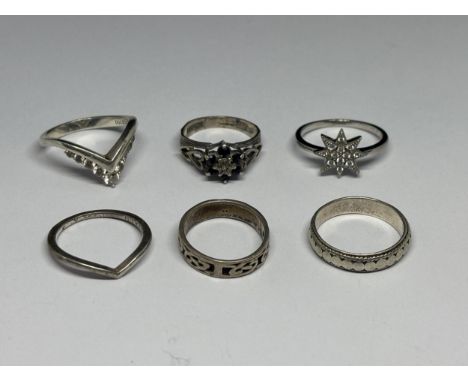 SIX VARIOUS SILVER RINGS