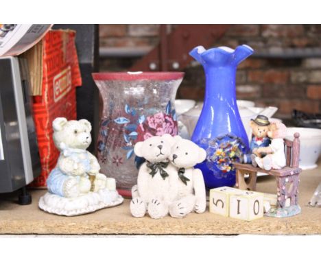 A VINTAGE BLUE ART GLASS VASE WITH EMBOSSED FLORAL DECORATION AND FLUTED RIM, TEDDY FIGURES, ETC,
