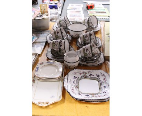 A MELBA TEASET WITH FLORAL AND BIRD DESIGN TO INCLUDE CAKE PLATES, A SUGAR BOWL, CREAM JUG, CUPS, SAUCERS AND SIDE PLATES, ET