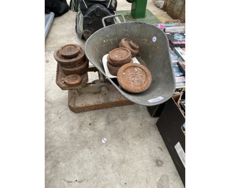 A SET OF VINTAGE BALANCE SCALES AND CAST IRON WEIGHTS