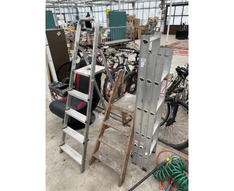 THREE VARIOUS LADDERS TO INCLUDE A FOUR RUNG ALUMINIUM STEP LADDER AND A WOODEN THREE RUNG STEP LADDER ETC