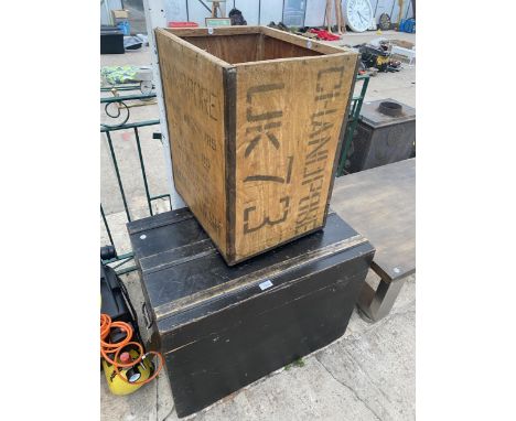 A LARGE VINTAGE WOODEN CHEST AND A TEA CHEST