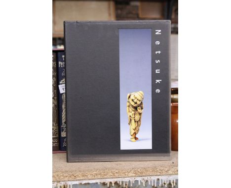 A BOXED SET OF NETSUKE, VOLUME 1 AND TWO, PUBLISHED BY ARNOLDSCHE, ART PUBLISHERS - AS NEW