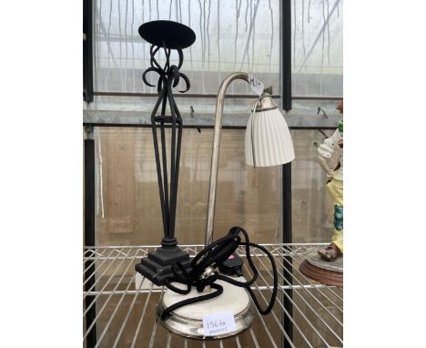 A DECORATIVE ADJUSTABLE TABLE LAMP AND A CANDLESTICK