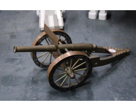 A LARGE VINTAGE BRASS AND COPPER CANNON