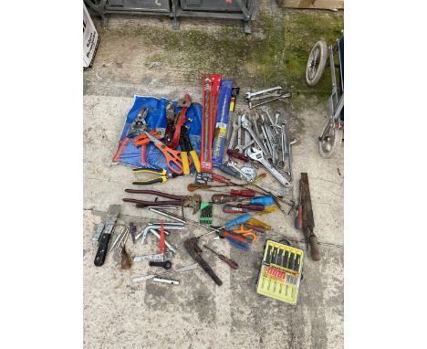 AN ASSORTMENT OF HAND TOOLS TO INCLUDE SPANNERS, SCREW DRIVERS AND PLIERS ETC