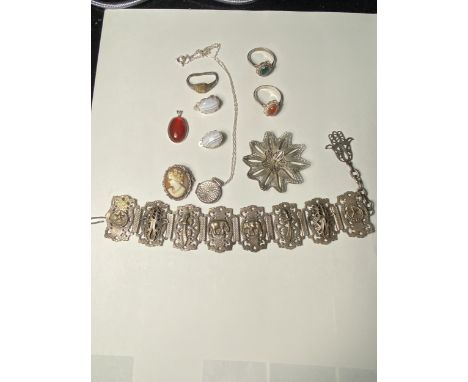VARIOUS ITEMS TO INCLUDE RINGS, EARRINGS, PENDANTS, CAMEO AND A POSSIBLY SILVER BROOCH AND ASIAN STYLE BRACELET