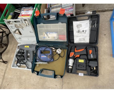 THREE CASED POWER TOOLS TO INCLUDE A CHALLENGE BATTERY DRILL, A CHALLENGE JIGSAW AND AN EARLEX HEAT GUN