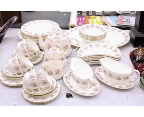 A MINTON SPRING BOUQUET PART DINNER SERVICE TO INCLUDE A TEAPOT, LIDDED SUGAR BOWL, MILK JUG, SAUCE BOAT AND SAUCER, DINNER P