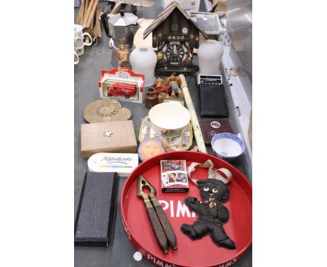 A LARGE MIXED LOT TO INCLUDE A PIMMS TRAY, A CUCKOO CLOCK, COMMODORE CALCULATOR, VINTAGE SHADES, TINS, ETC