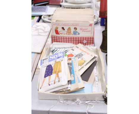 A COLLECTION OF VINTAGE DRESS MAKING PATTERNS, ETC.,