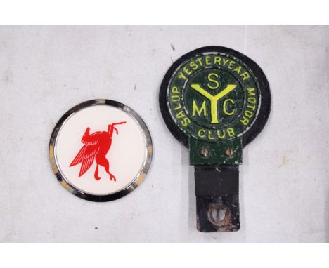 TWO VINTAGE CAR BADGES TO INCLUDE PEGASUS MOBIL GAS STATION AND SALOOP YESTERYEAR ORIGINAL SMC MOTOR CLUB