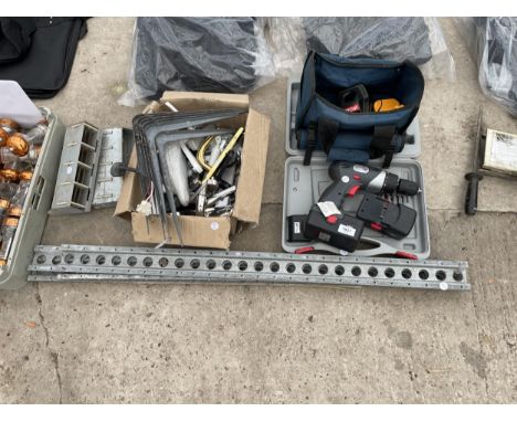 AN ASSORTMENT OF TOOLS AND HARDWARE TO INCLUDE A BATTERY DRILL, TAPS AND WALL BRACKETS ETC
