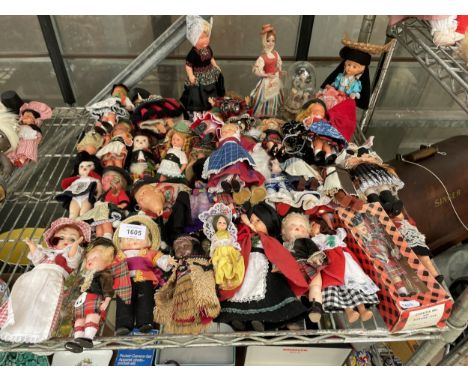 A LARGE ASSORTMENT OF VINTAGE DOLLS