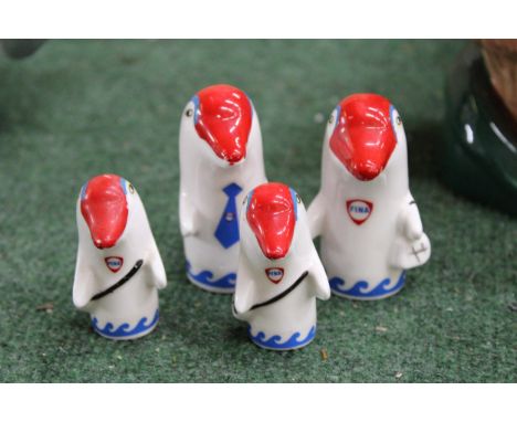 FOUR 1960'S FINA PETROL CERAMIC DOLPHINS