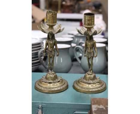 A VINTAGE HEAVY BRASS PAIR OF PHAROAH CANDLESTICKS