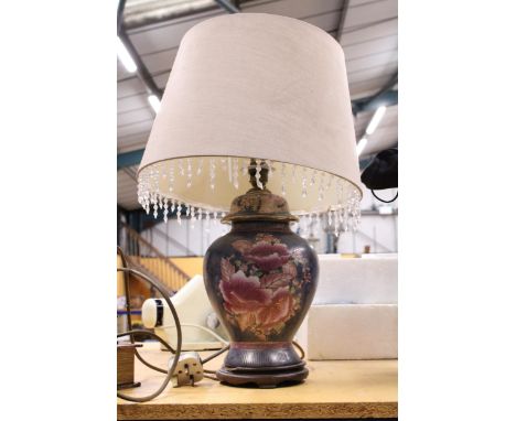 A CERAMIC LAMP WITH FLORAL PATTERN AND A SHADE, HEIGHT TO TOP OF SHADE APPROX 55CM