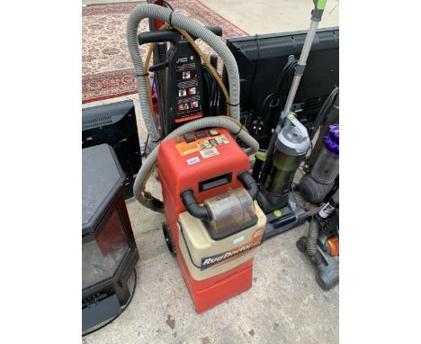 AN INDUSTRIAL RUG DOCTOR CARPET CLEANER