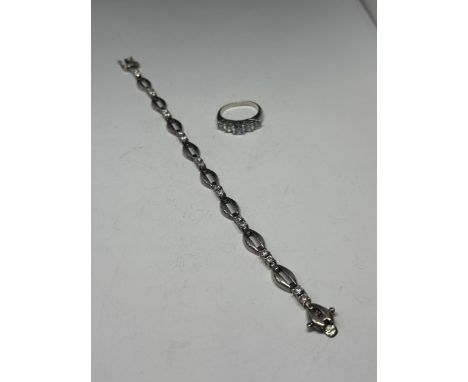 A SILVER FIVE STONE DRESS RING AND A SILVER AND STONE BRACELET