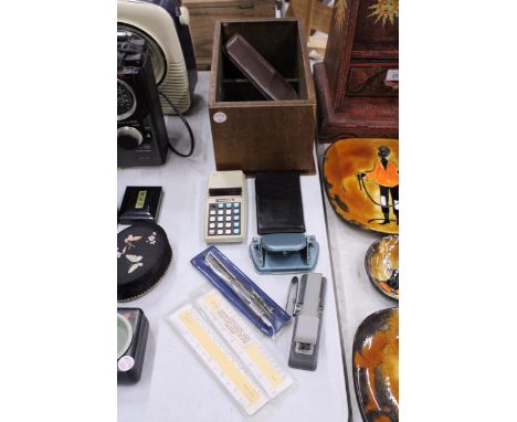 A QUANTITY OF VINTAGE CALCULATORS AND TECHNICAL DRAWING EQUIPMENT IN A WOODEN BOX