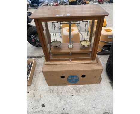 A SET OF VINTAGE WOODEN CASED BALANCE SCALES