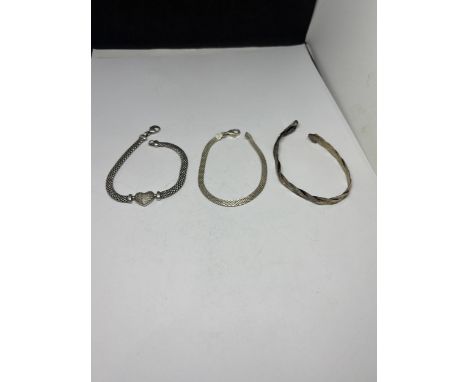 THREE SILVER BRACELETS