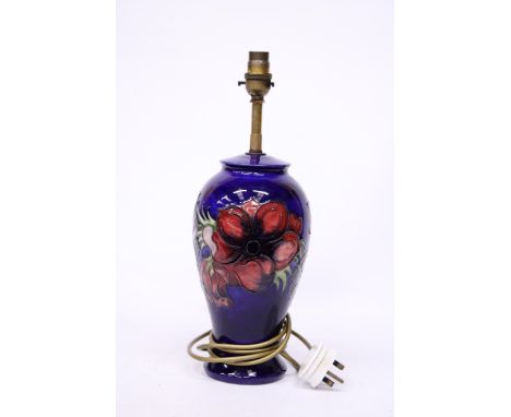 A MOORCROFT ANEMONE LAMP BASE - 27 CM TO THE TOP OF THE CERAMIC BASE