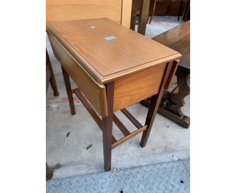 A RETRO TEAK DROP LEAF TABLE WITH MAGAZINE SHELF, 22" X 19.5" OPENED