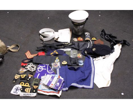 A LARGE COLLECTION OF ROYAL NAVY ITEMS TO INCLUDE A CAP, GAITORS, SHOULDER PADS, ROYAL MARINERS FULL DRESS SERGEANT STRIPES, 