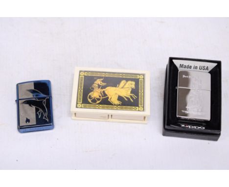 TWO ZIPPO LIGHTERS, ONE BOXED PLUS A GREEK MATCHBOX HOLDER