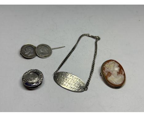 FOUR MARKED SILVER ITEMS TO INCLUDE A CAMEO, COIN PIN, BADGE AND BRACELET