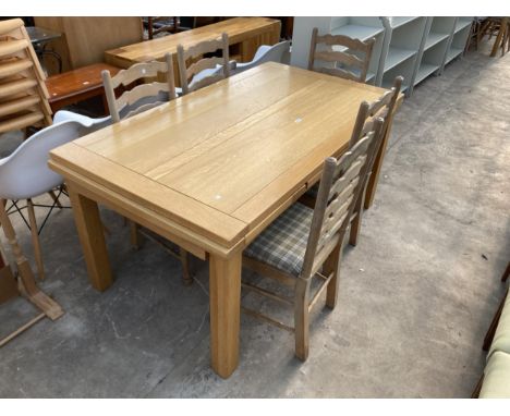 AN OAK DRAW LEAF DINING TABLE, 63" X 35.5" (LEAVES 19.5" EACH) AND FIVE LADDER BACK RUSH SEATED DINING CHAIRS