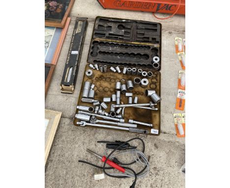 A SOCKET SET AND A TORQUE WRENCH