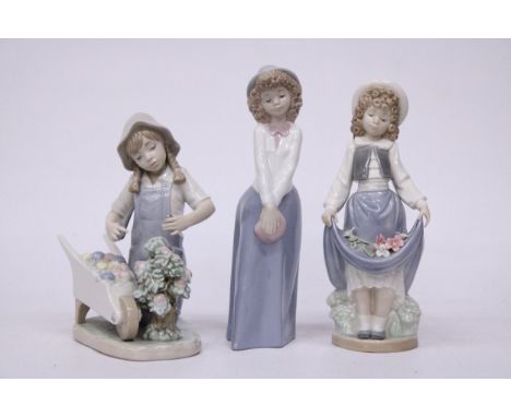 A GROUP OF NAO FIGURES TO INCLUDE A GIRL HOLDING FLOWERS IN HER SKIRT (SMALL CHIP TO FLOWER), "TOO CUTE" AND "LITTLE GARDNER"