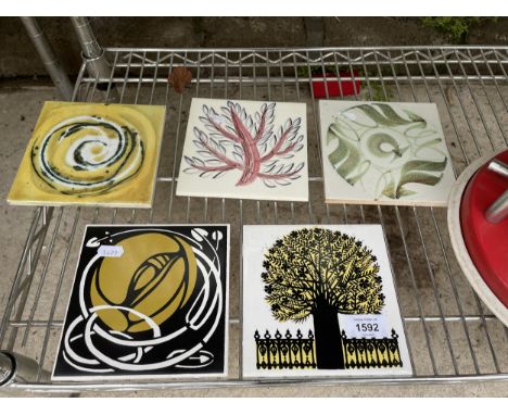 FIVE VARIOUS DECORATIVE CERAMIC TILES