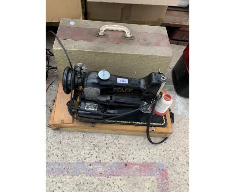 A VINTAGE PFAFF ELECTRIC SEWING MACHINE WITH CARRY CASE