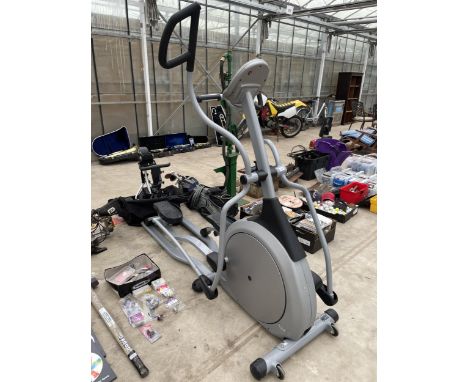 A VISION FITNESS CROSS TRAINER WITH CABLE AND MANUAL IN THE OFFICE