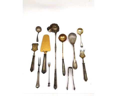 A collection of silver and silver plate, to include a silver punch ladle, a shell design caddy spoon, two pickle forks and a 